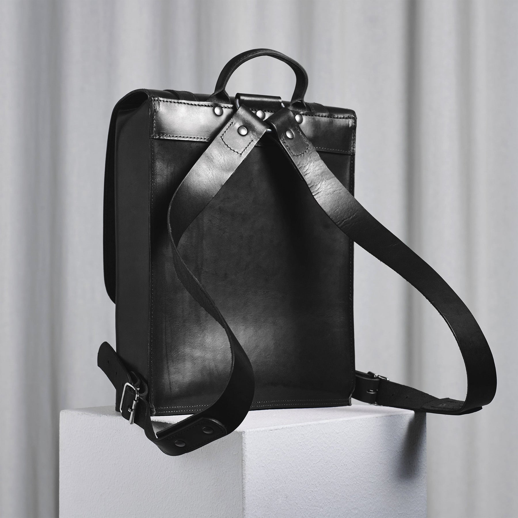 Black Small Backpack. The sleek leather backpack that will last a lifetime. Made in Finland. – KASPERI